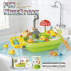 Children's bathtub toy set with ducks and accessories on a tiled bathroom floor.