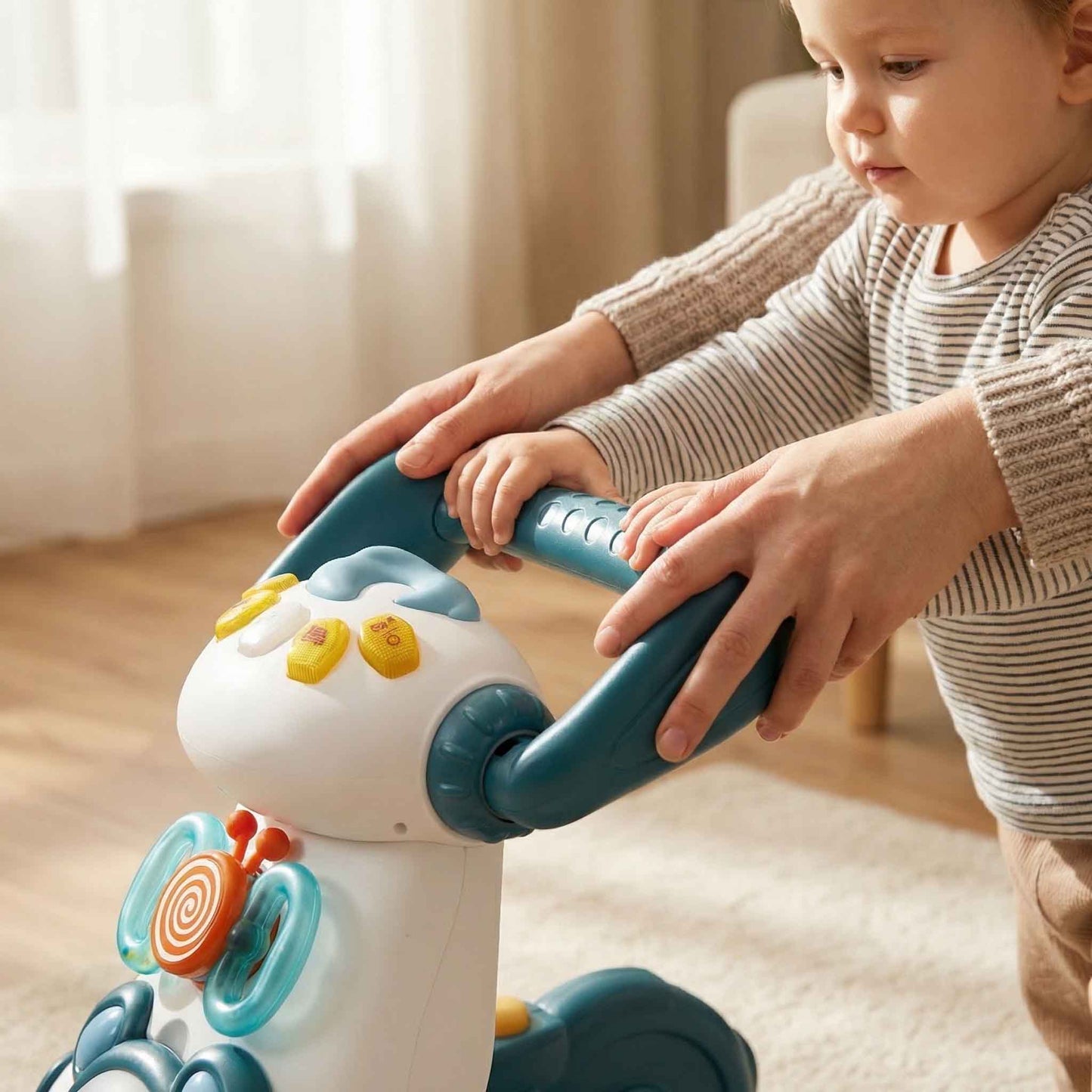 Sit-to-ride baby walker toy designed to support early walking and balance development