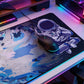Gaming mouse on a mouse pad with an astronaut design, surrounded by colorful RGB lighting.
