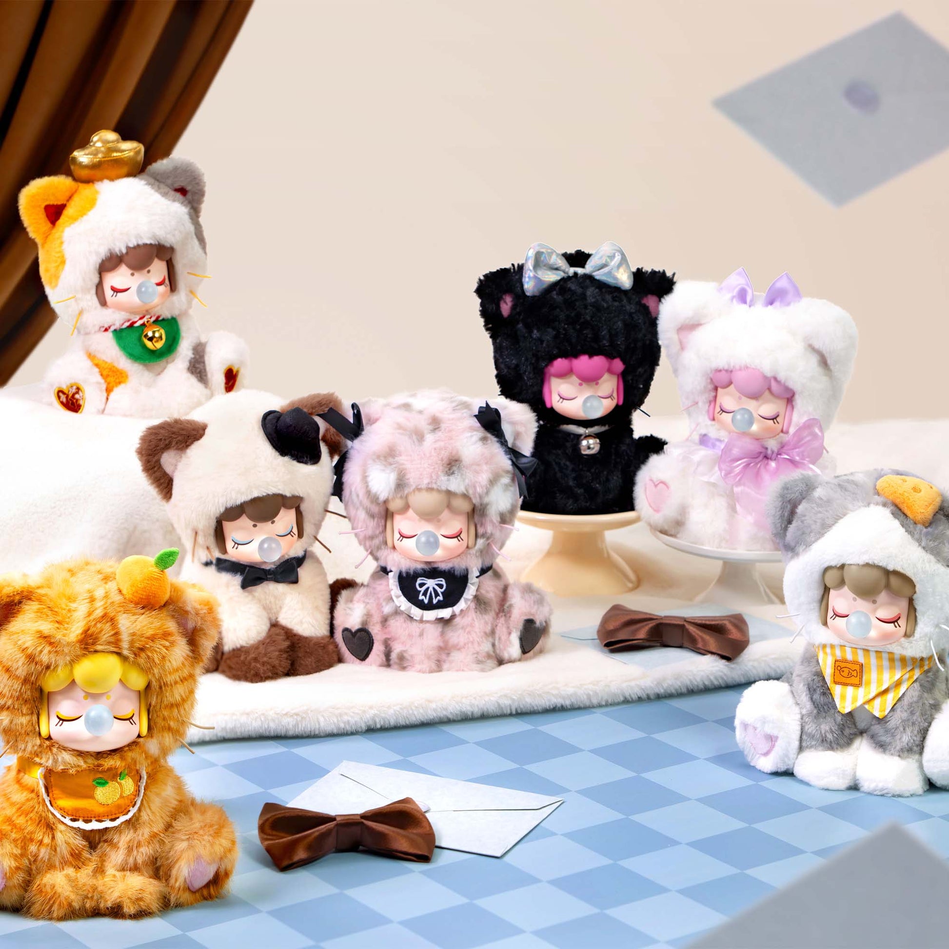 Collection of plush toys with animal-themed costumes on a checkered floor.