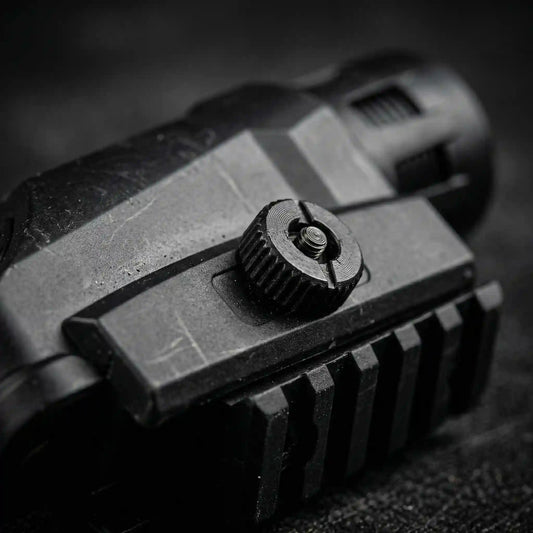 Rail mounted tactical red laser sight module with precision adjustment controls