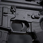 Close-up of a black firearm with visible branding