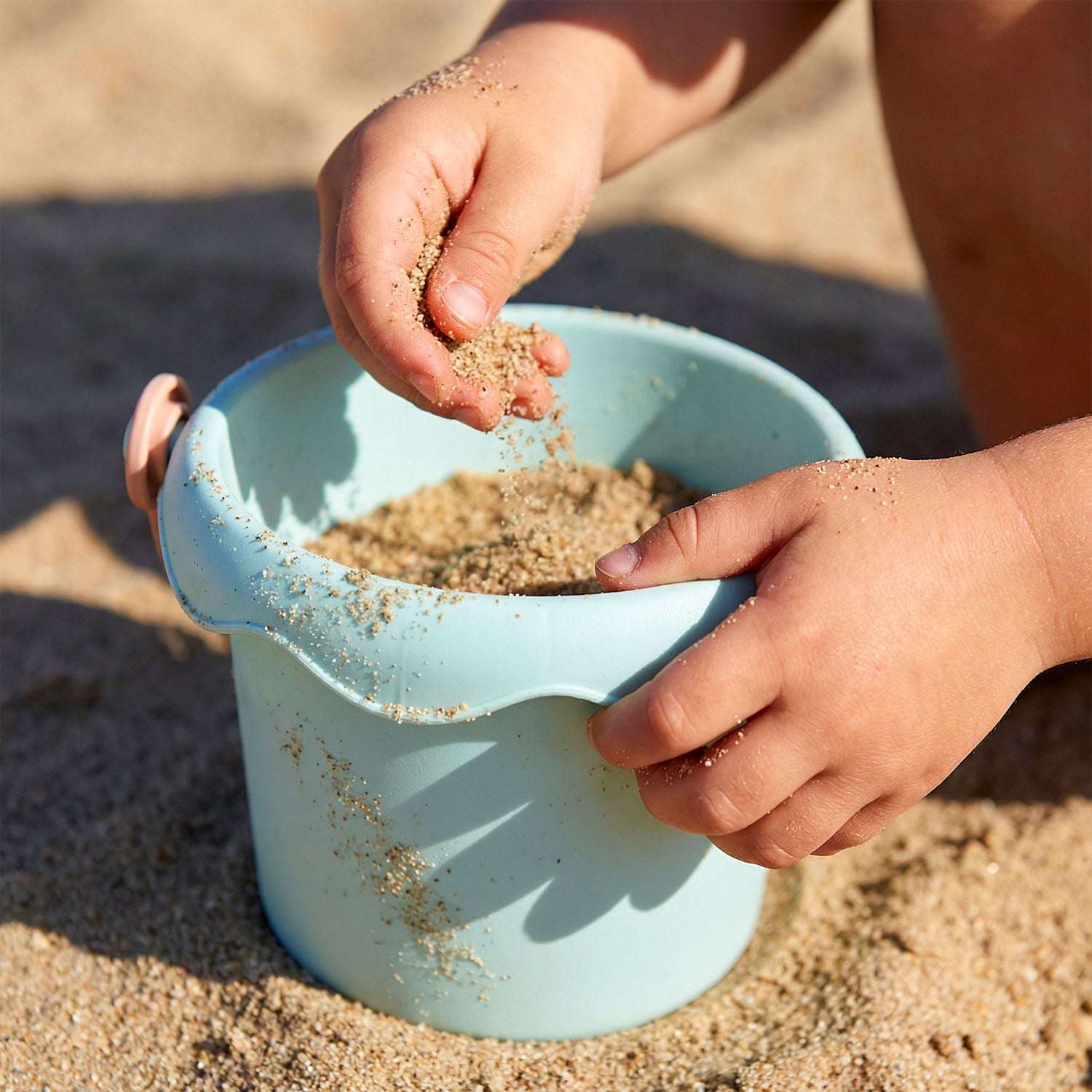 Children’s sand toy set including beach truck shovel rake and water bucket