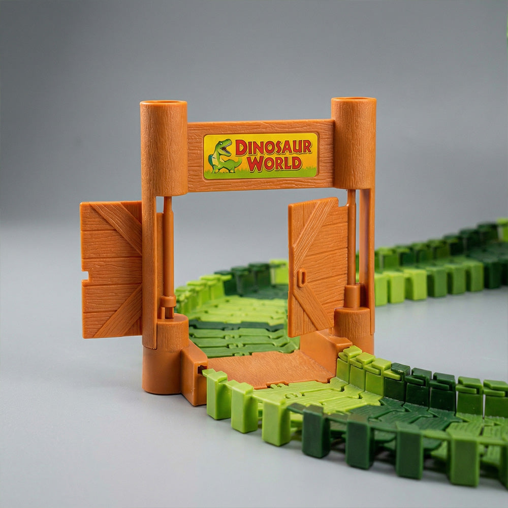 Toy set with 'Dinosaur World' sign and green baseplate on a gray background