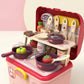 Toy kitchen set with various utensils and cookware 