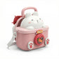 Pink toy washing machine with a cartoon cat on top 