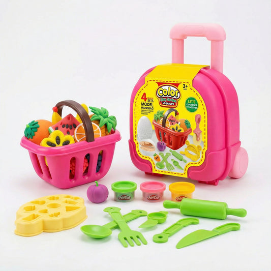 Colorful toy kitchen set with a pink suitcase, fruits, vegetables, and utensils
