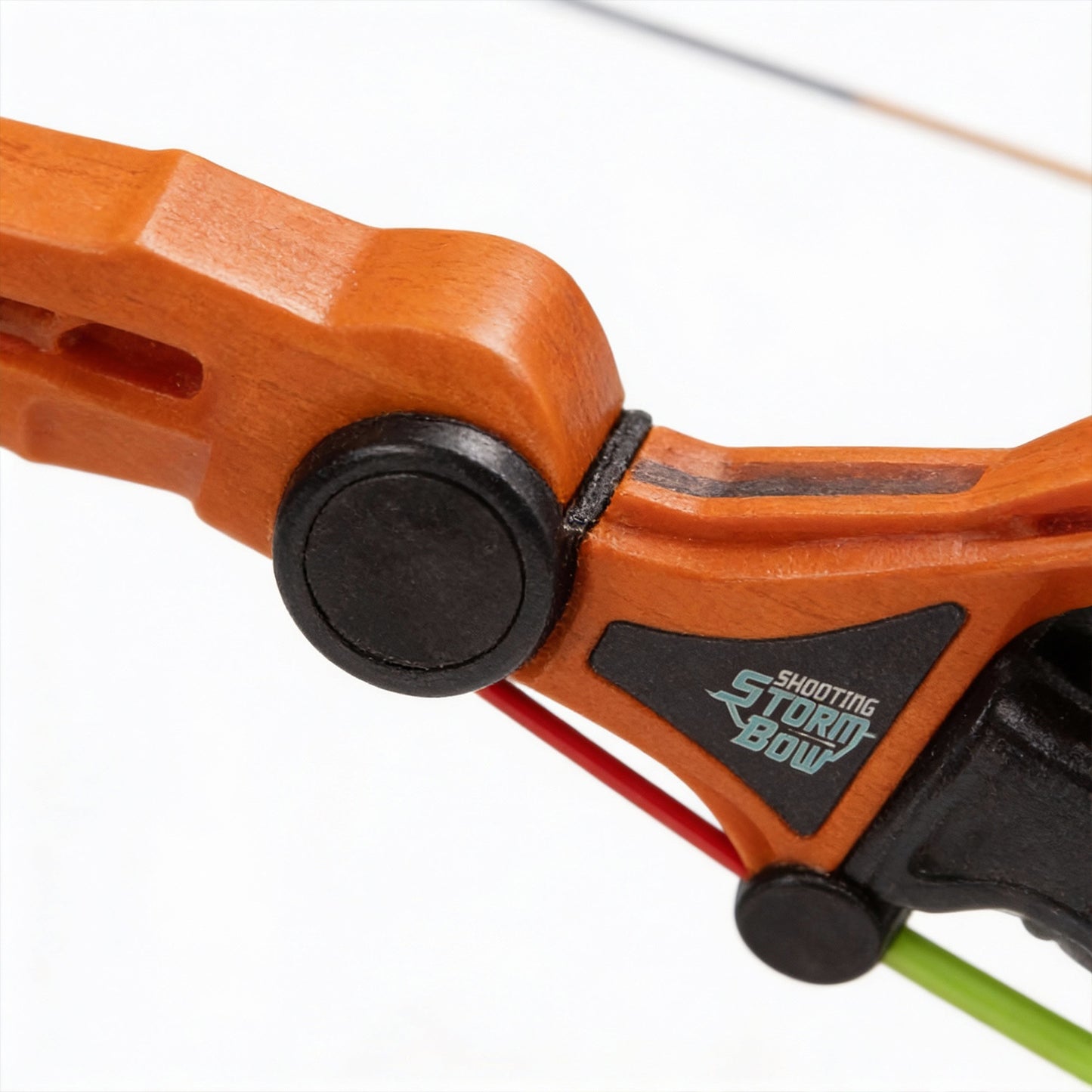Close-up of an orange archery bow with a white background