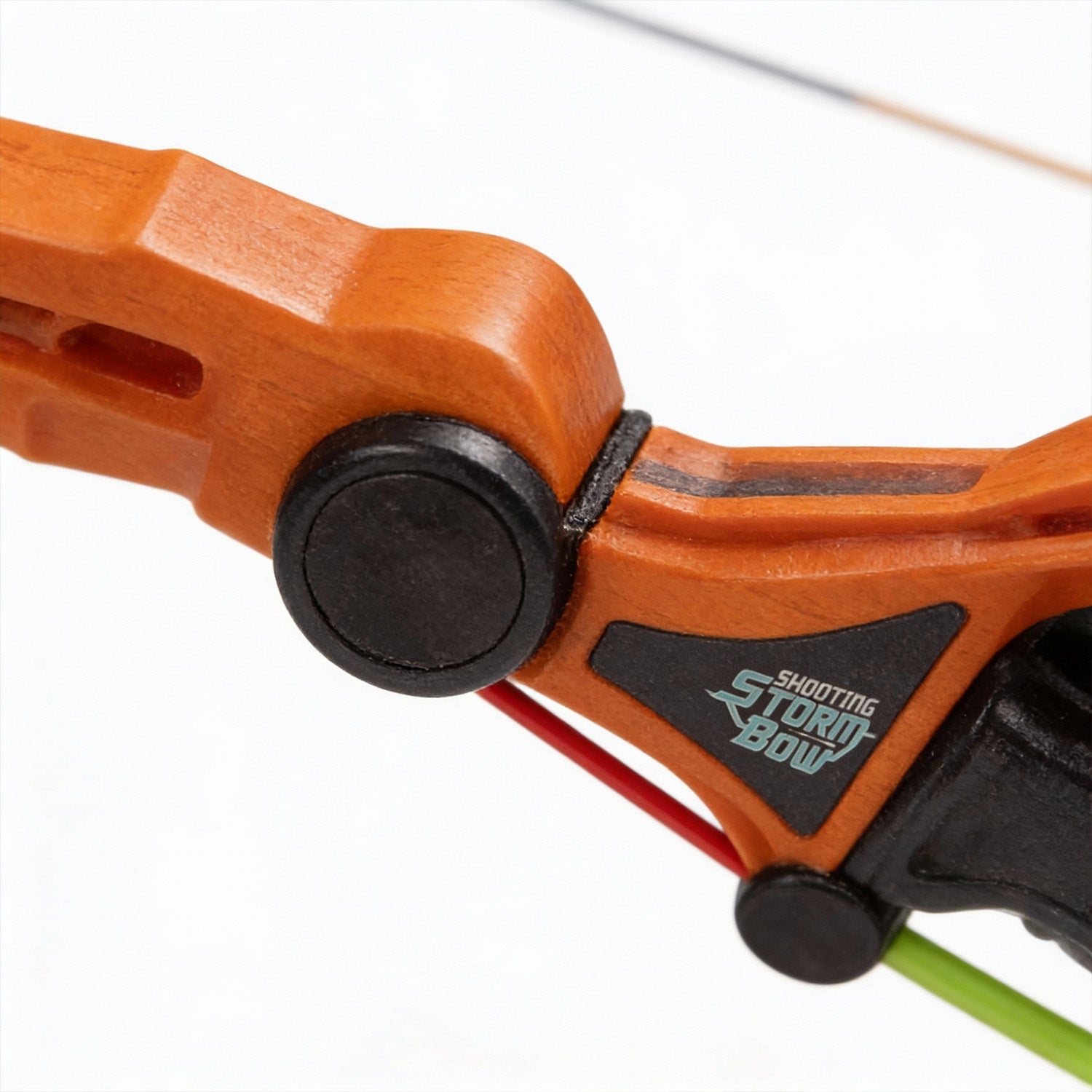Close-up of an orange archery bow with a white background