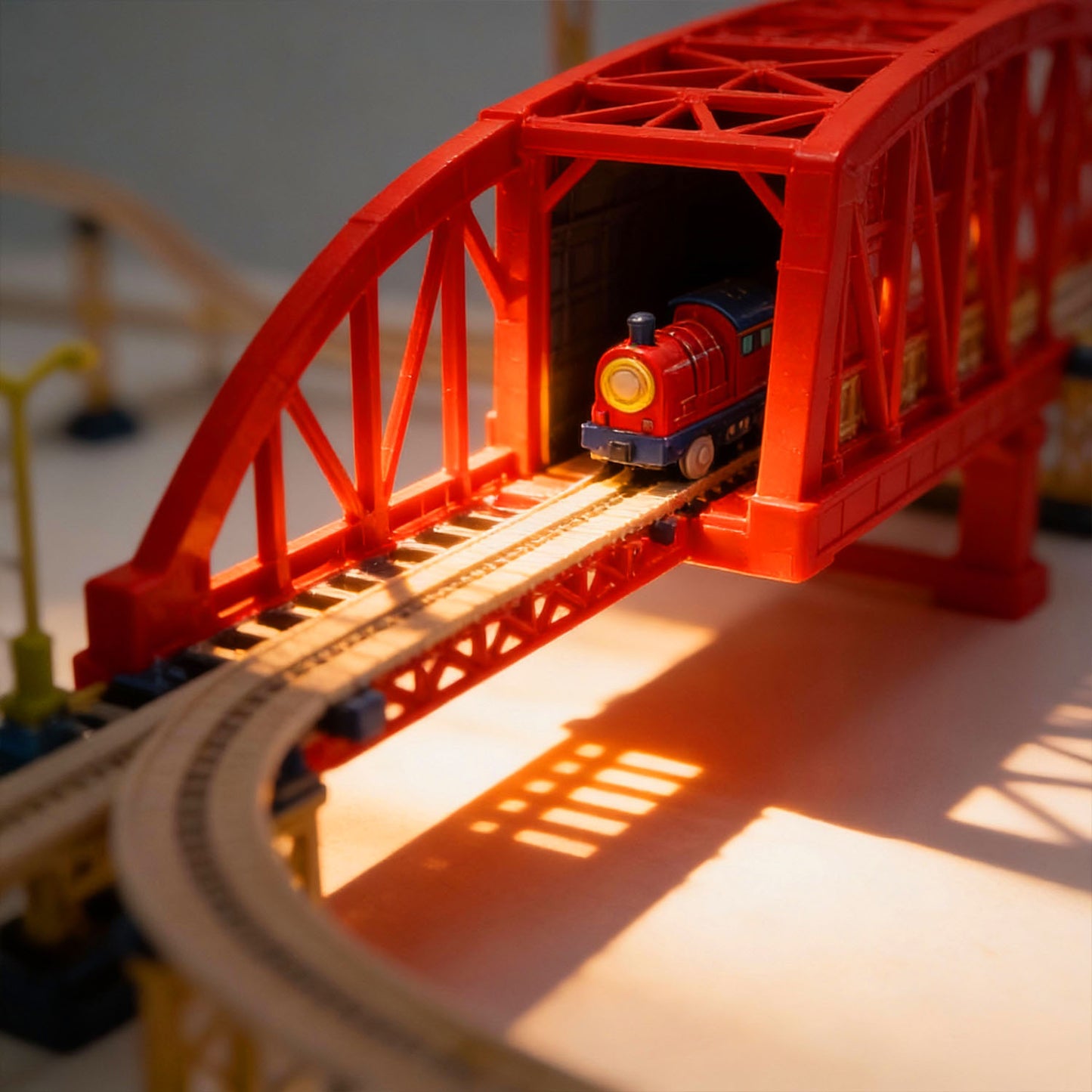 Children train track toy set with bridges and buildings