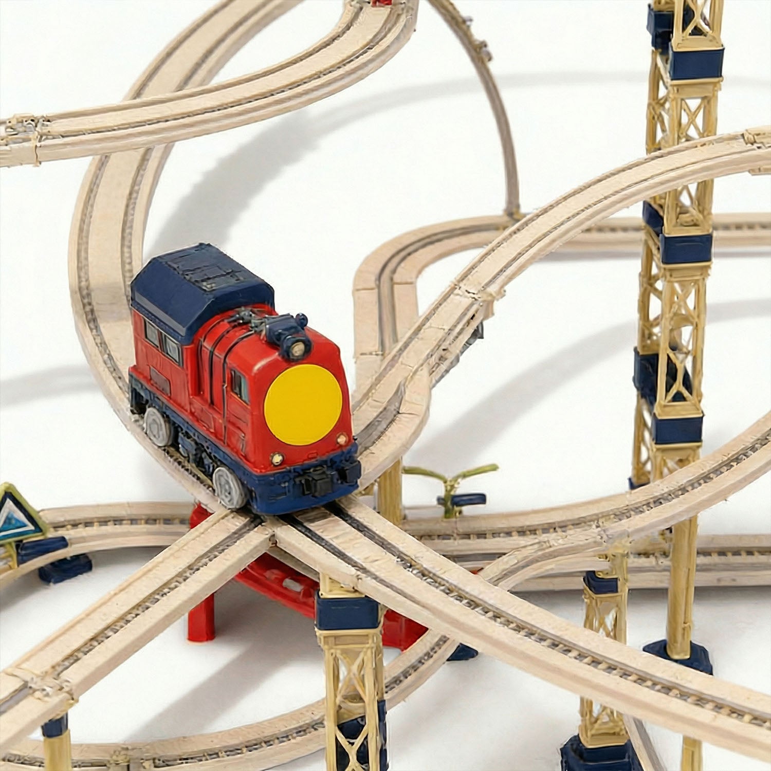 City railway train playset with elevated bridges and loop track