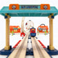 Children playing with Track City train playset